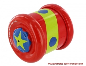 Come back roller wheel made of metal : toy made of red metal in the shape of a wheel.