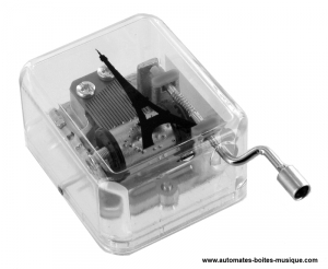 Hand-cranked music box made of resin.