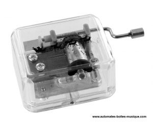 Spieluhr - Kleines Kurbelwerk im Kunststoffgehäuse.