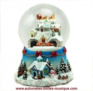 Christmas musical water globe made of polystone : musical water globe "Flying Santa Claus and a train".