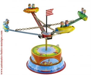 Jouet mécanique en métal, tôle et fer blanc agrafé - Référence de ce jouet mécanique en métal, tôle et fer blanc agrafé: MM266