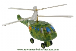 Collectable mechanical tin toy : green helicopter made of sheet metal and tin.