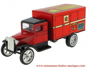 Collectable mechanical tin toy : fire fighters’ trunk made of sheet metal and tin.