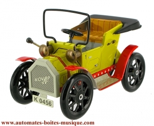 Collectable mechanical tin toy : vintage car made of sheet metal and tin.