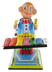 Collectable mechanical tin toy : Musician monkey made of sheet metal and tin.