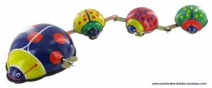 Collectable mechanical toy made of sheet metal and tin : mechanical toy "Family of ladybirds".