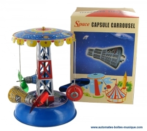 Juguete mecánico de colección de metal, chapa y hojalata brochada : juguete mecánico "Space capsule carrousel".