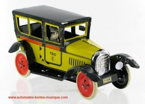 Jouet mécanique en métal, tôle et fer blanc agrafé - Référence de ce jouet mécanique en métal, tôle et fer blanc agrafé: RP42