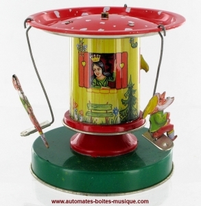 Collectable mechanical tin toy : "Dwarf Carousel" made of sheet metal and tin.