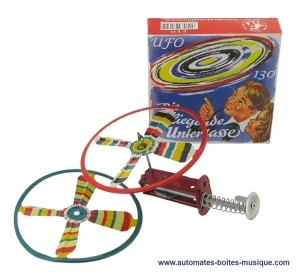 Giocattolo meccanico da collezione di metallo, lamiera e latta aggraffati : giocattolo meccanico "Lanciatore di UFO".