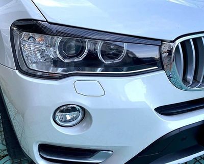 Garniture Décorative Pour Phares BMW X3 F25 X4 F26 (2014-2017) - 2 Pièces Noir Brillant / Effet Carbone - Auto-collant Design
