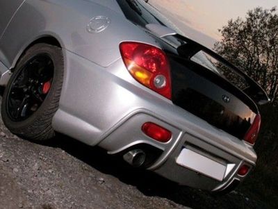 PARE CHOC ARRIERE HYUNDAI COUPE "ST STYLE" (2002/2007)