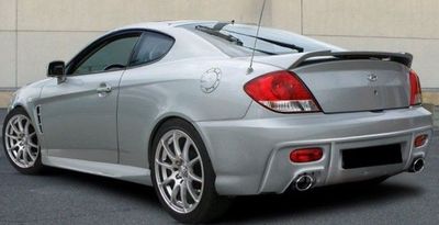 PARE CHOC ARRIERE HYUNDAI COUPE "ST STYLE" (2002/2007)