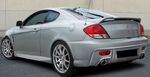 PARE CHOC ARRIERE HYUNDAI COUPE "ST STYLE" (2002/2007)