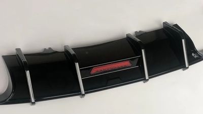 DIFFUSEUR DE PARE CHOC ARRIERE EN ABS "DTM LOOK AVEC FEU STOP" AUDI A4 B9 8W STANDARD / SLINE OU S4 PHASE 1 (08-2015/04-2019)