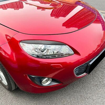 PAUPIERES DE PHARES MAZDA MX5 NC PHASE 2 PIANO BLACK OU CARBONE LOOK (2009/2014)