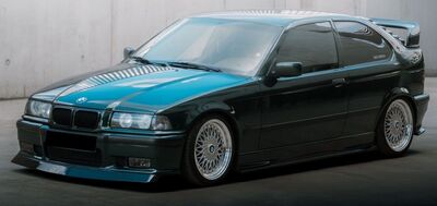 LAME DE PARE CHOC AVANT BMW E36 PACK M ST LINE  FAT STYLE PIANO BLACK (1992/1998)