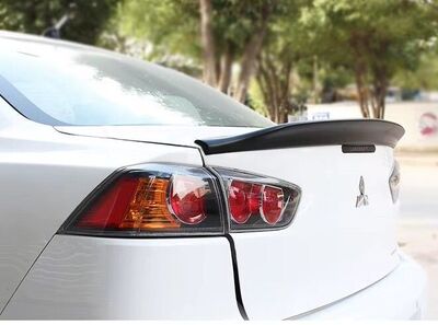 BECQUET DE COFFRE MITSUBISHI LANCER EX (2008/2015)