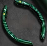 ENJOLIVEURS DE VOLANT D'ORIGINE CARBONE LOOK GAMME RENAULT RS