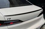 BECQUET DE COFFRE EN FIBRE A PEINDRE,NOIR BRILLANT OU CARBONE (VERNI OU FORGE) BMW SERIE 7 G70 / I7 G70  (2022+)