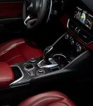 ENJOLIVEUR DE CONSOLE CENTRALE CARBONE ALFA ROMEO GIULIA / ALFA ROMEO STELVIO PHASE 2 (2020/2023)