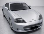 PARE CHOC AVANT HYUNDAI COUPE "ASTON SPIRIT" CPN (2002/2007)
