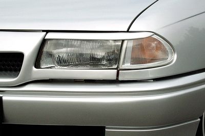 PAUPIERES DE PHARES OPEL ASTRA F CS STYLE (1991/1998)