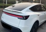 BECQUET DE COFFRE TESLA MODEL Y PHASE 2 PIANO BLACK FINISH (2025+)