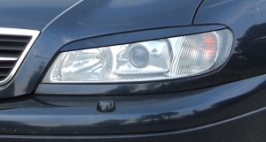 PAUPIERES DE PHARES POUR OPEL OMEGA B PHASE 2 (10-1999/2003)