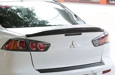 BECQUET DE COFFRE MITSUBISHI LANCER EX (2008/2015)