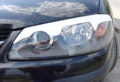 PAUPIERES DE PHARES POUR NISSAN ALMERA N16 PHASE 2 TGT (2003/2006)