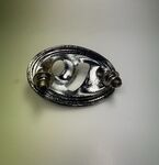 right headlight bracket (original re-chromed)