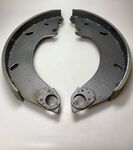 12 inch front brake pads mounted HY on standard exchange jaws (without rings)