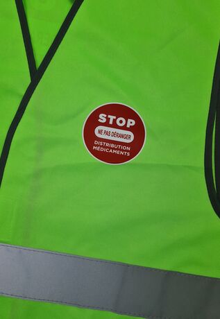 Gilet sécurité STOP NE PAS DERANGER Distribution de médicaments en cours - vert lime