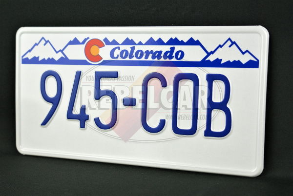 Blue And White License Plate With Mountains
