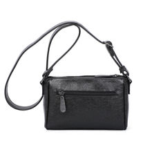 Sac porté travers bimatière habillé d’un patchwork tressé