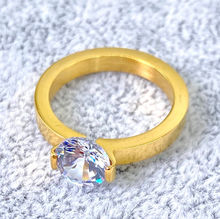Bague solitaire en acier doré avec grosse pierre brillante - 12 pièces
