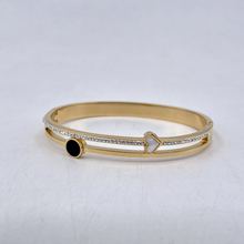 Bracelet manchette en acier inoxydable doré incrustation de cristaux