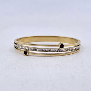 Bracelet manchette en acier inoxydable doré incrustation de cristaux