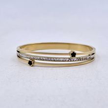 Bracelet manchette en acier inoxydable doré incrustation de cristaux