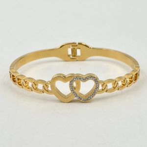 Bracelet manchette en acier inoxydable doré incrustation de cristaux