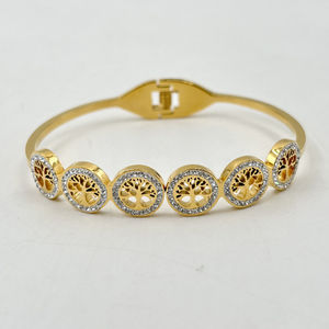 Bracelet manchette en acier inoxydable doré incrustation de cristaux