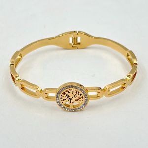 Bracelet manchette en acier inoxydable doré incrustation de cristaux