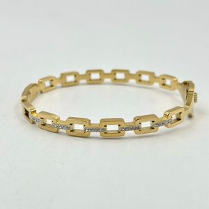 Bracelet manchette en acier inoxydable doré incrustation de cristaux