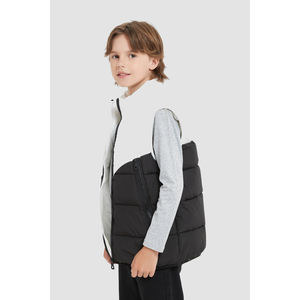 Doudoune sans manches en tissu déperlant matelassé bicolore