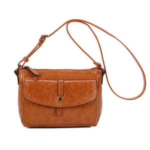 Sac porté en bandoulière zippé avec une longue sangle réglable