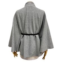 Poncho à col montant avec ceinture pour cintrer la taille