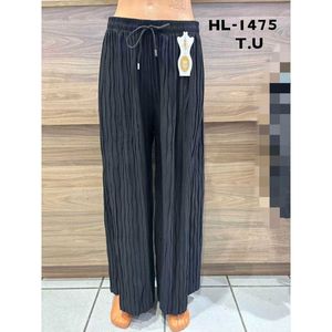 Pantalon coupe ample effet plissée avec une ceinture élastique