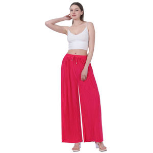 Pantalon coupe ample effet plissée avec une ceinture élastique