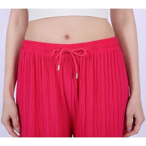 Pantalon coupe ample effet plissée avec une ceinture élastique